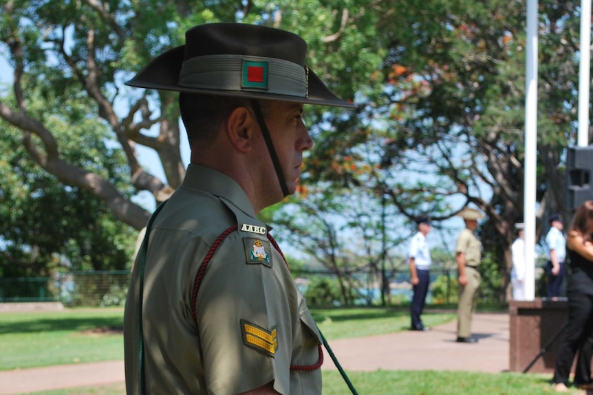 A soldier stands by Darwin's Cenotaph on Remembrance Day, November 11, 2014