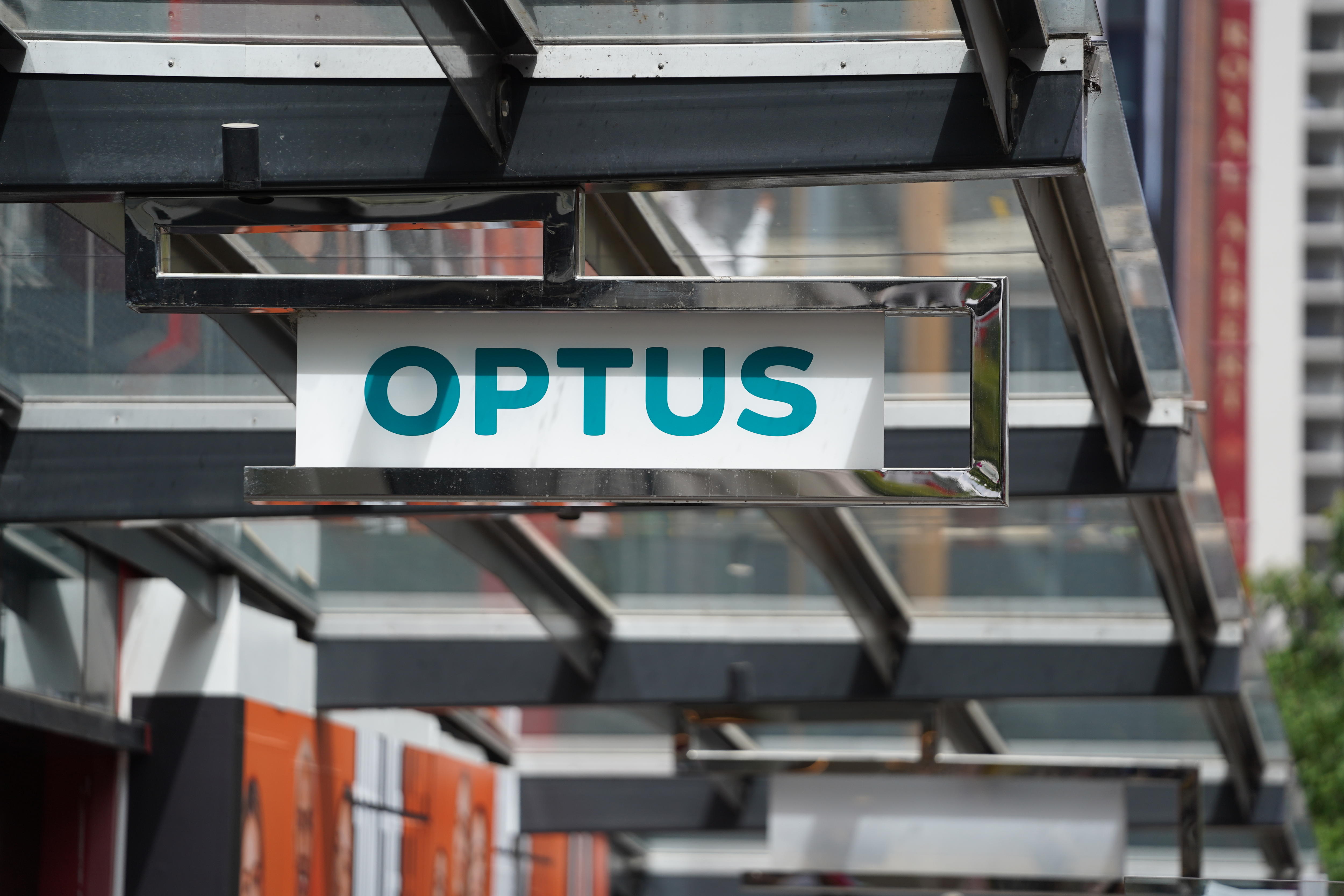 People walking past Optus store in Brisbane's Queen Street Mall