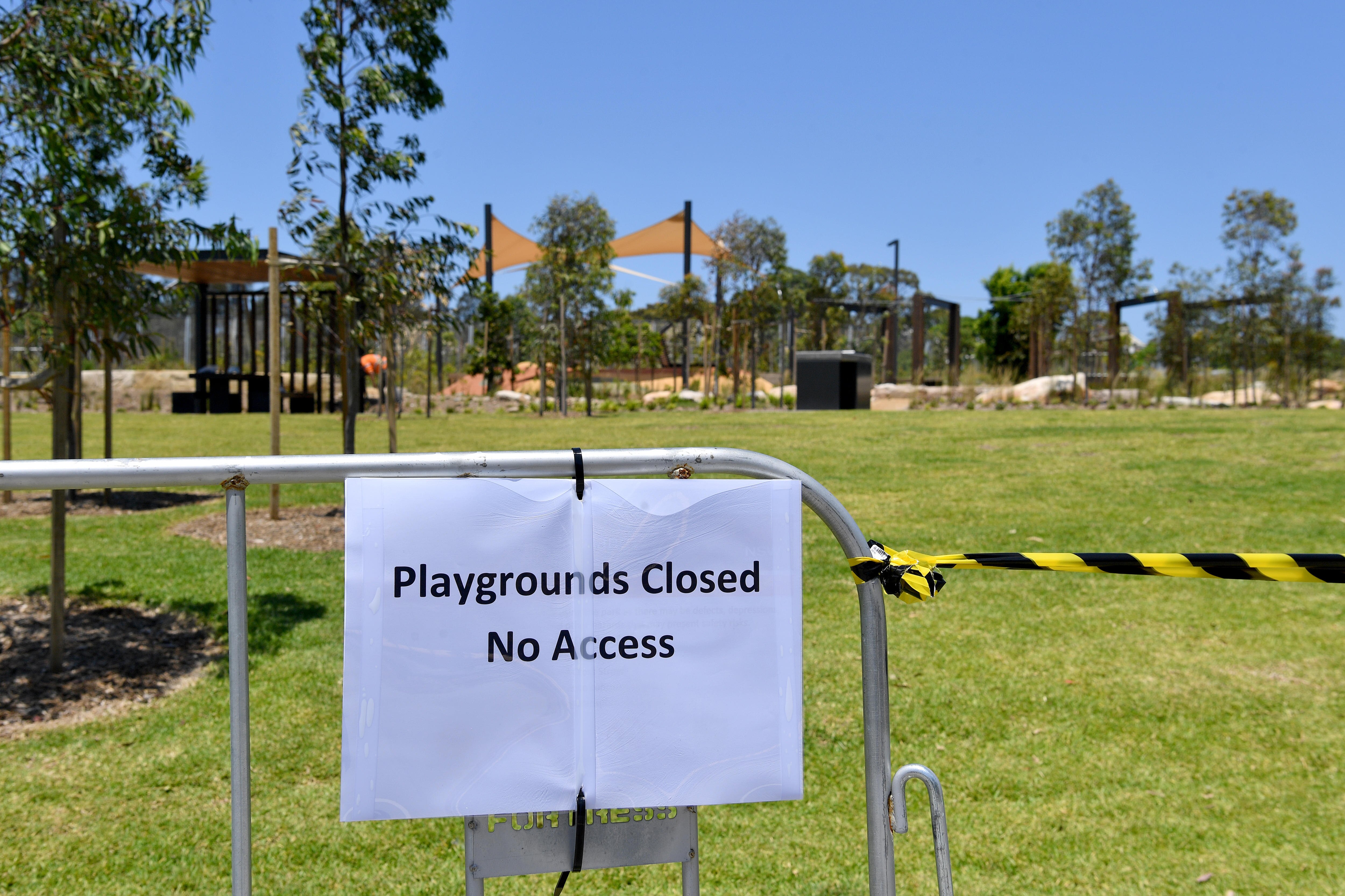 a closed sign at the december 2023 opened rozelle parklands after asbestos contaminated mulch was found at site