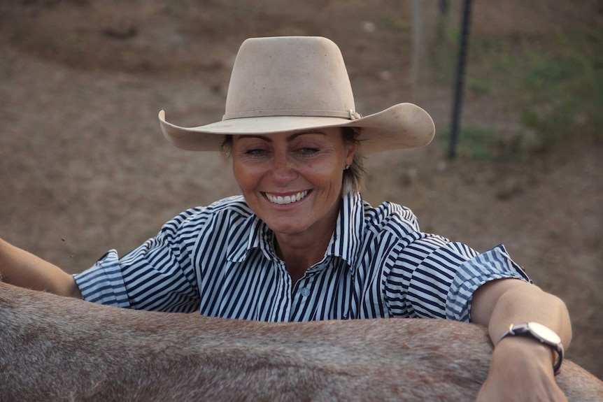 Sundown at Amungee Mungee station where Emma Brown watches her children ride their horses.