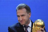 Sweet victory ... Russia's Deputy Prime Minister Igor Shuvalov poses with the World Cup trophy