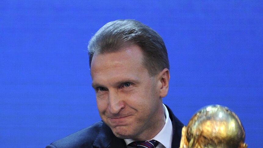 Sweet victory ... Russia's Deputy Prime Minister Igor Shuvalov poses with the World Cup trophy
