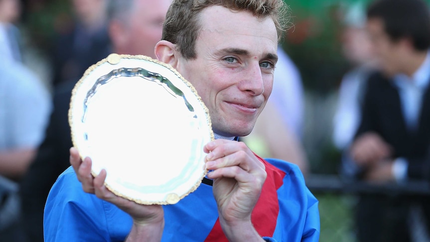 Ryan Moore holds the Cox Plate