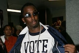 Sean 'Diddy' Combs wears a Vote Or Die shirt.
