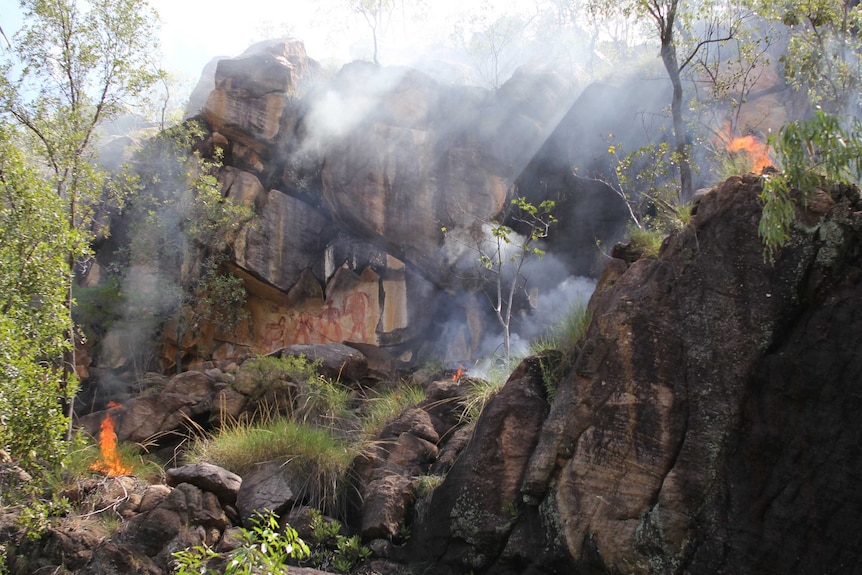 a fire near rock art in Nitmiluk National Park