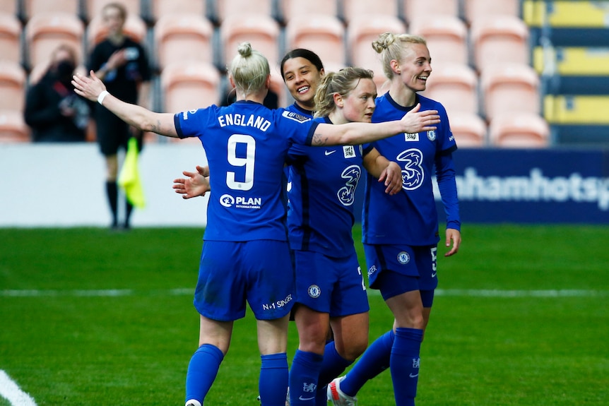 Players celebrating on the pitch