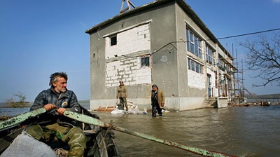 Danube swells: The floodwaters are yet to peak but a dam collapse has helped stricken towns.