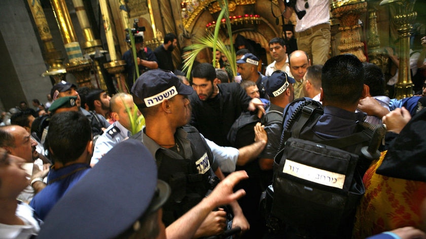 Greek Orthodox and Armenian worshippers scuffle with Israeli policemen