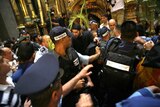 Greek Orthodox and Armenian worshippers scuffle with Israeli policemen