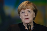 German Chancellor Angela Merkel gives a statement.