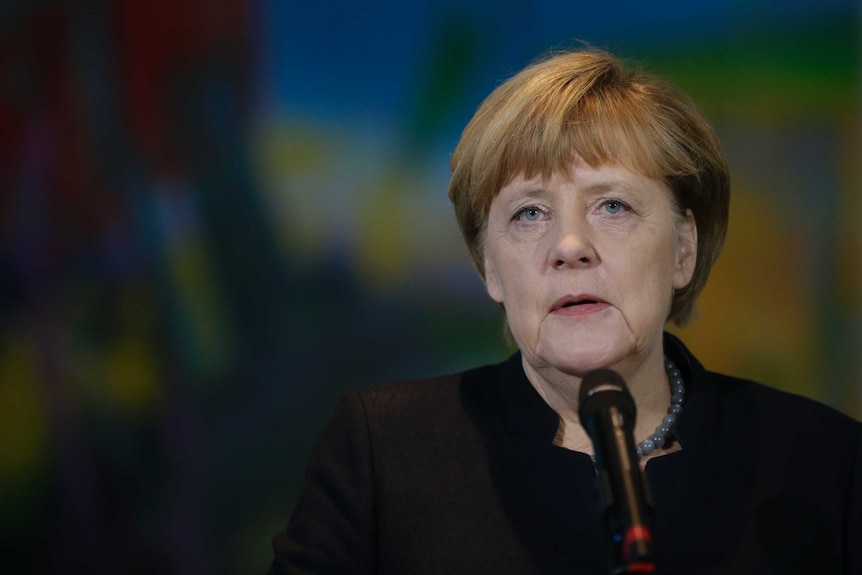 German Chancellor Angela Merkel gives a statement.