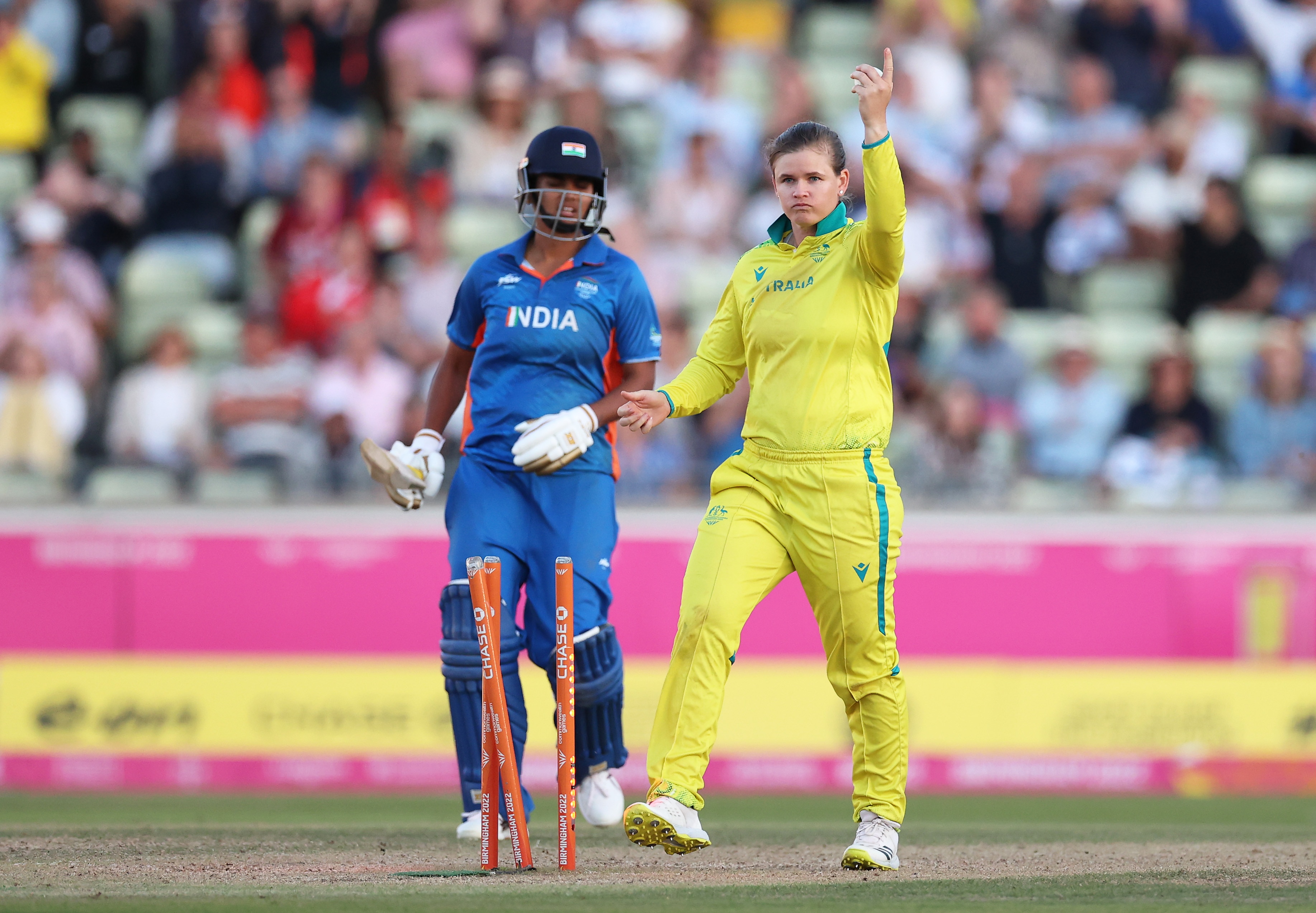 Jess Jonassen runs out Megnha Singh in the 2022 Commonwealth Games Twenty20 cricket final.