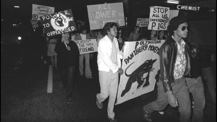 A black and white photo shows a protest with 'Polynesian Panther' signs. 