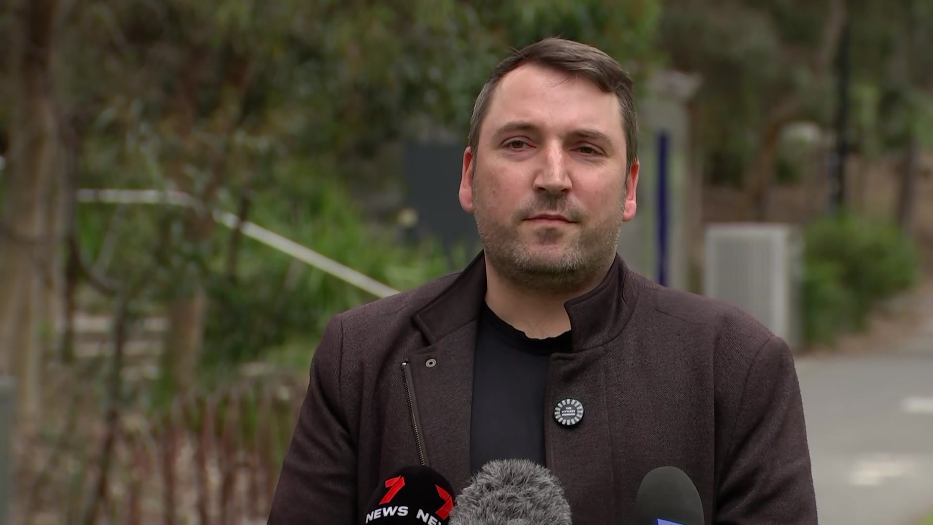 Tim Baxter, with the bush behind him.