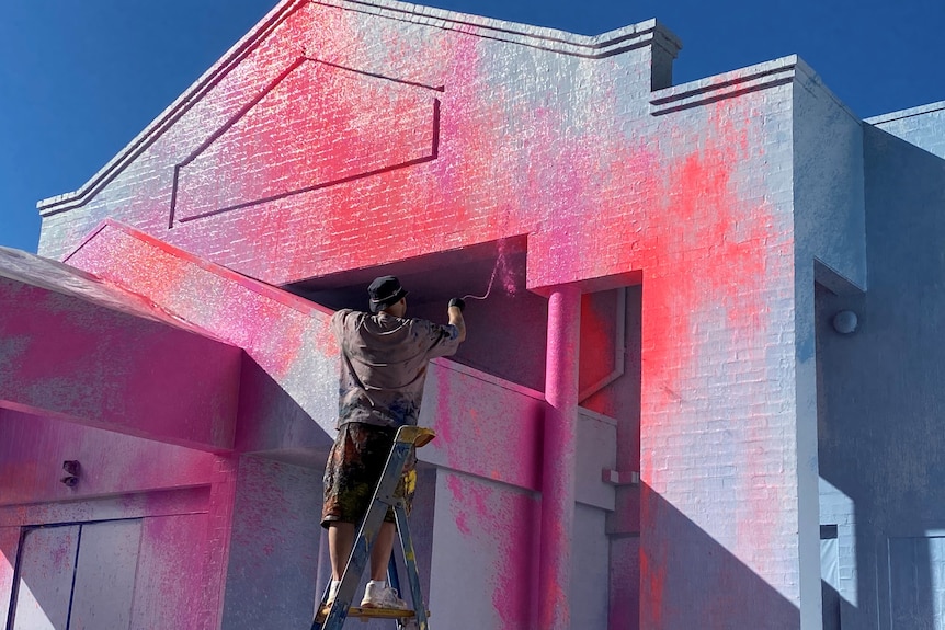 Ash Keating splashes pink paint on the Warrnambool Gallery.