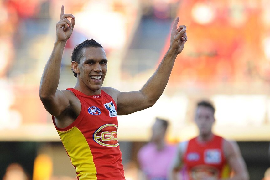 Harley Bennell celebrates a Suns goal