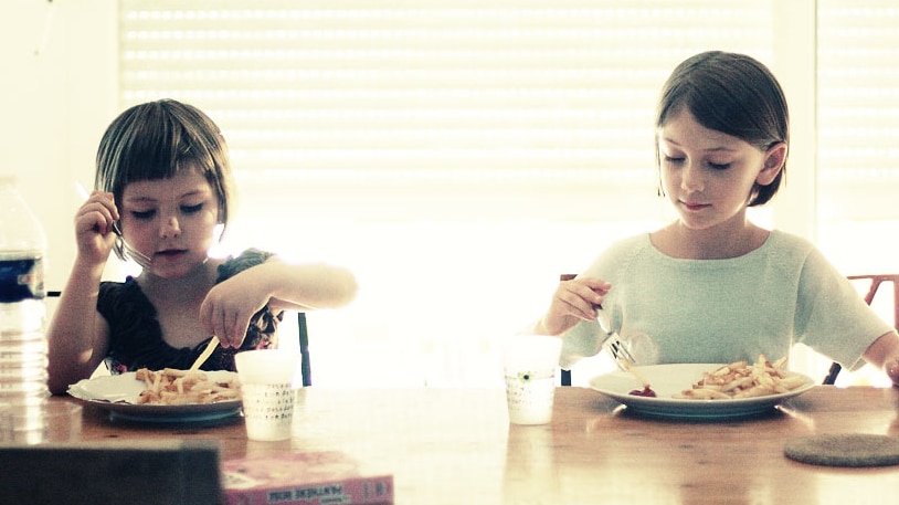 French children at the dinner table.