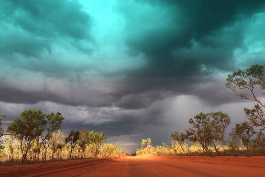 shot of Cape Leveque road with dark storm clouds