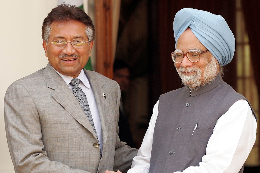 President Pervez Musharraf shakes hands with Indian Prime Minister Manmohan Singh.