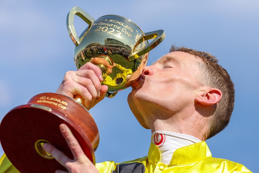 Mark Zahra kisses the Melbourne Cup