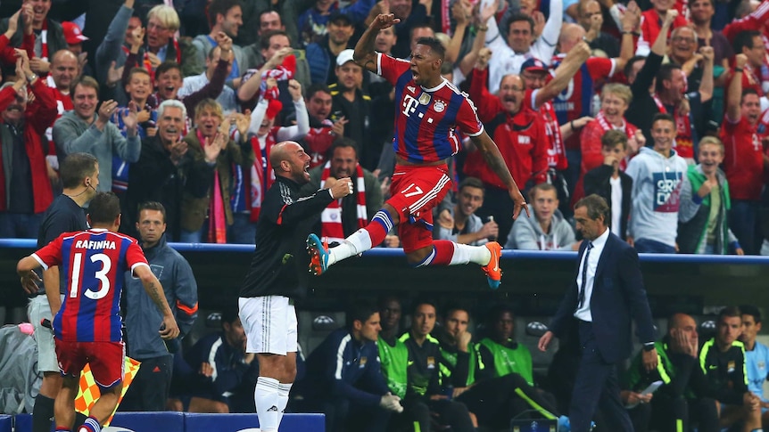Jerome Boateng celebrates his winner for Bayern Munich against Manchester City