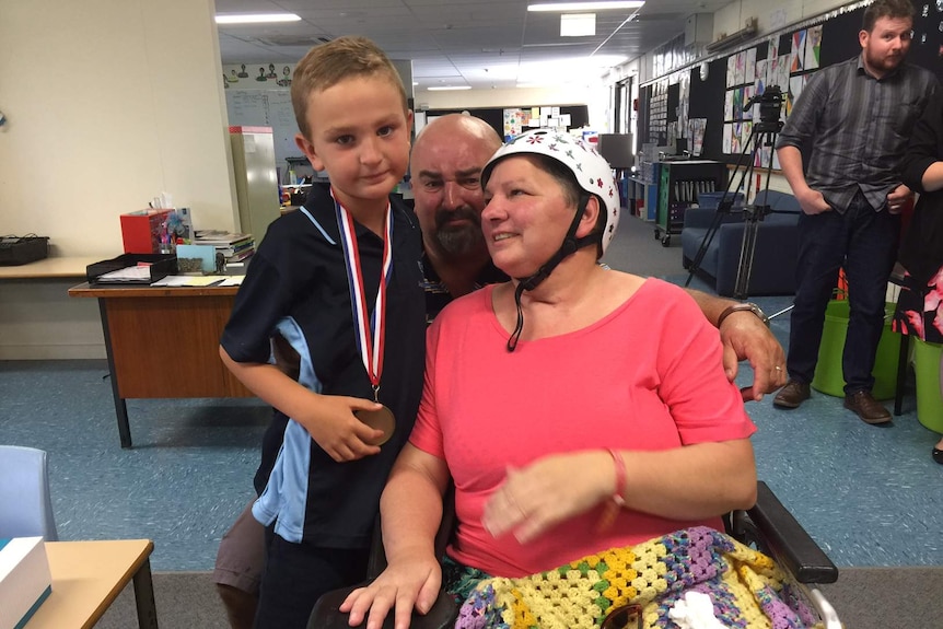 Aaron Zorzi with his parents.