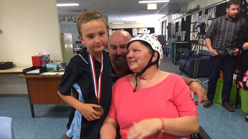 Aaron Zorzi with his parents.