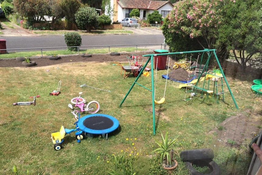 Suburban front garden with children's toys
