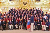 Vladimir Putin with Russia's London Paralympics team.