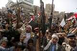 Armed Houthi followers rally against Saudi-led air strikes in Sanaa June 14, 2015