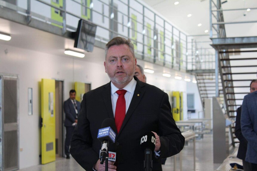 NSW Corrective Services Minister Anthony Roberts addresses the media  at the new Clarence Corrections Centre