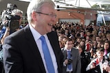 Kevin Rudd arrives at Aquinas College in Melbourne