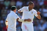 Rory Kleinveldt takes the first of three second-innings wickets against Australia.