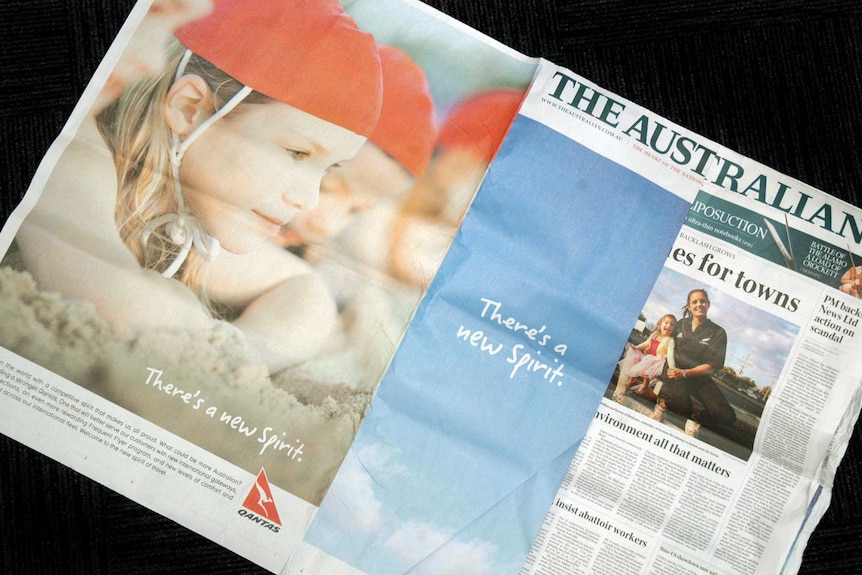 Qantas wrap around ad in The Australian