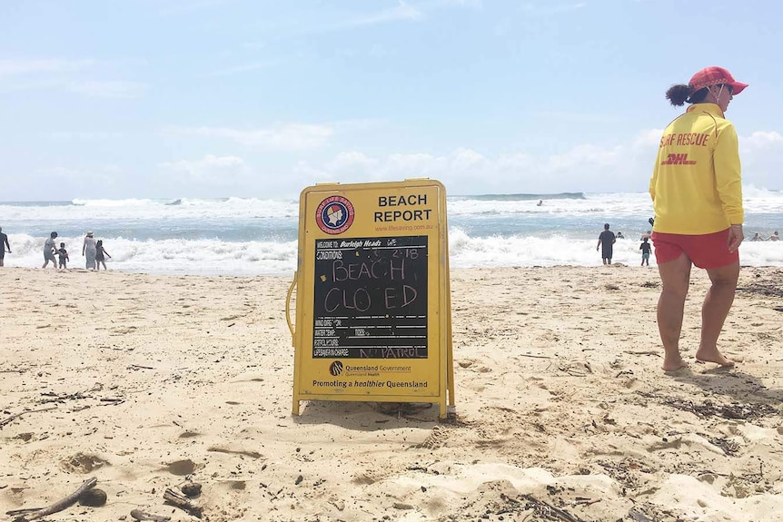 Beach closed sign at Burleigh on Queensland's Gold Coast on February 18, 2018