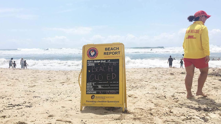 Beach closed sign at Burleigh on Queensland's Gold Coast on February 18, 2018