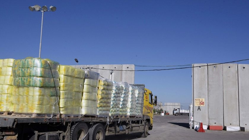 A humanitarian supplies truck arrives at the Kerem Shalom terminal.