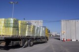 A humanitarian supplies truck arrives at the Kerem Shalom terminal.