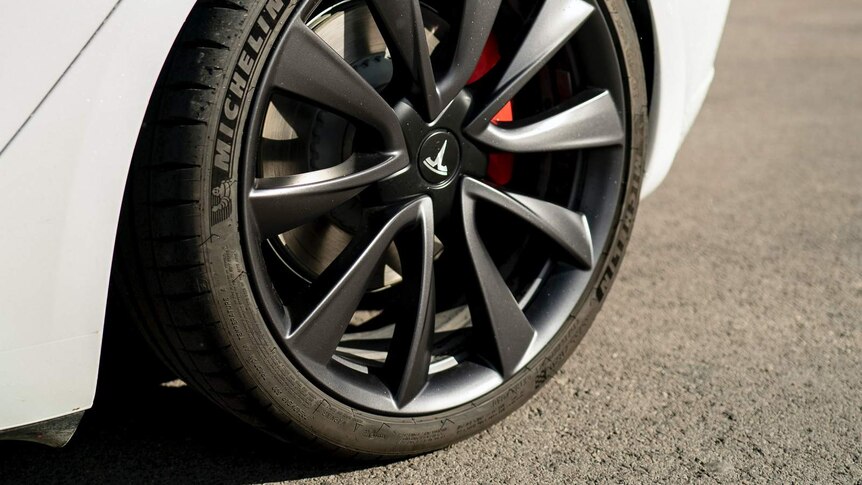 Close up of tyre and mudguard of a new electric car