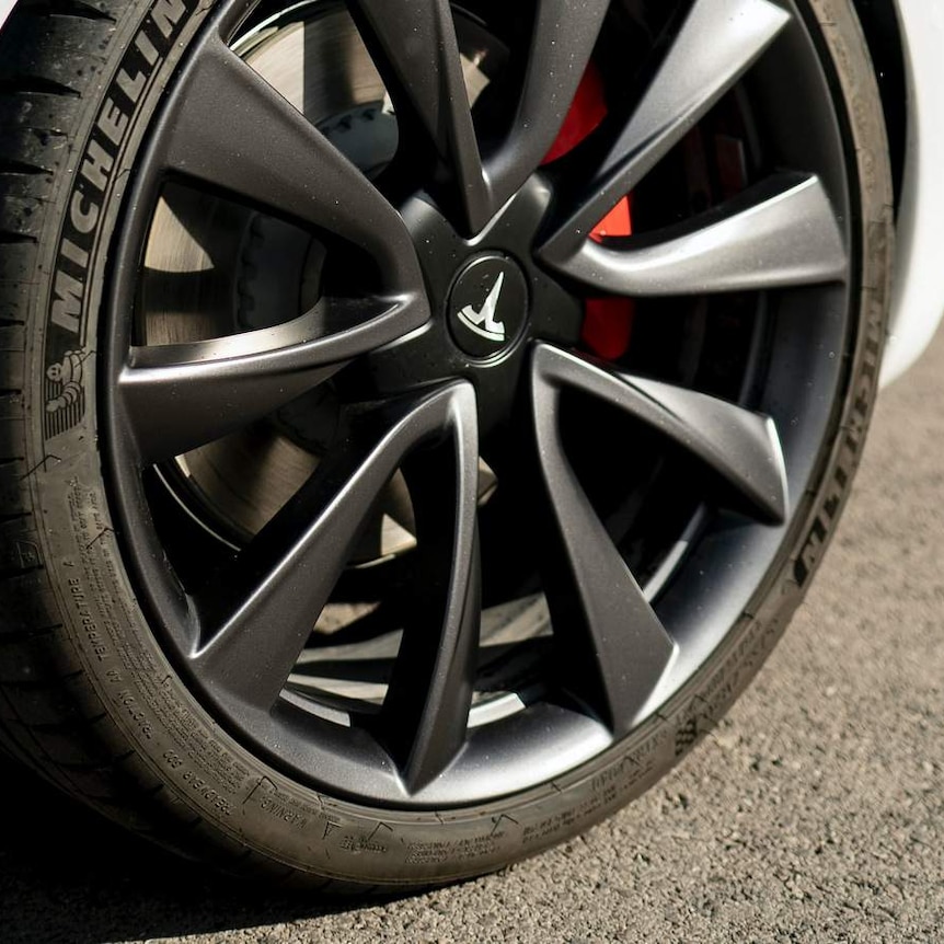 Close up of tyre and mudguard of a new electric car
