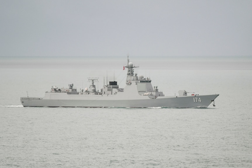 A chinese navy ship in the ocean.