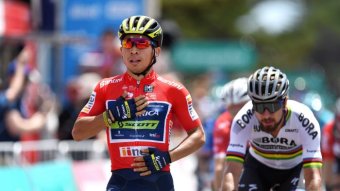 Caleb Ewan puts his hand on his chest.