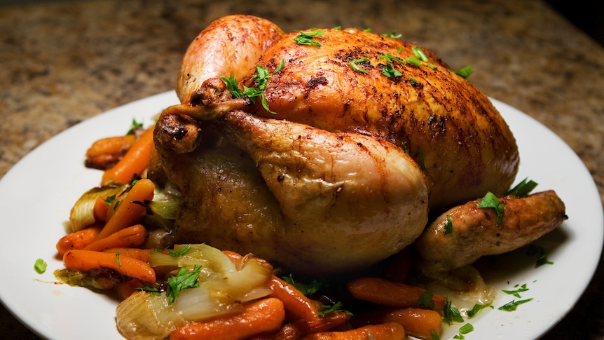 Roast chicken on a plate.