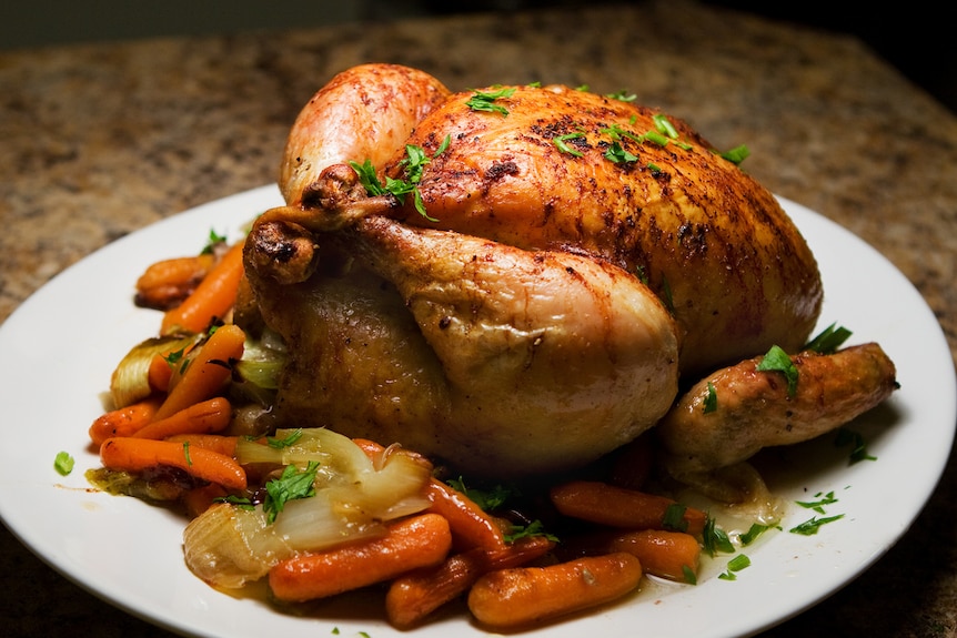 Roast chicken on a plate.