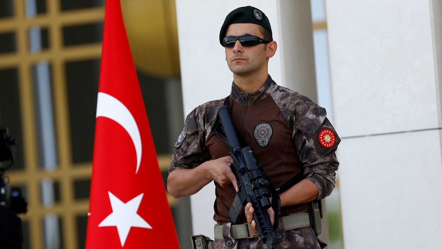 Special forces guard the entrance of the Presidential Palace in Ankara.