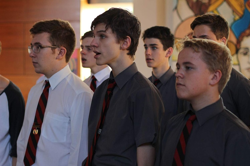 Student Alexander O'Mealy (centre) one of 34 young Queenslanders chosen to be part of Gallipoli choir