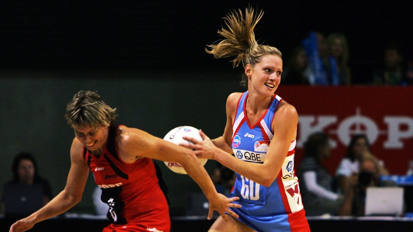 Julie Seymour is intercepted by Kimberley Purcell