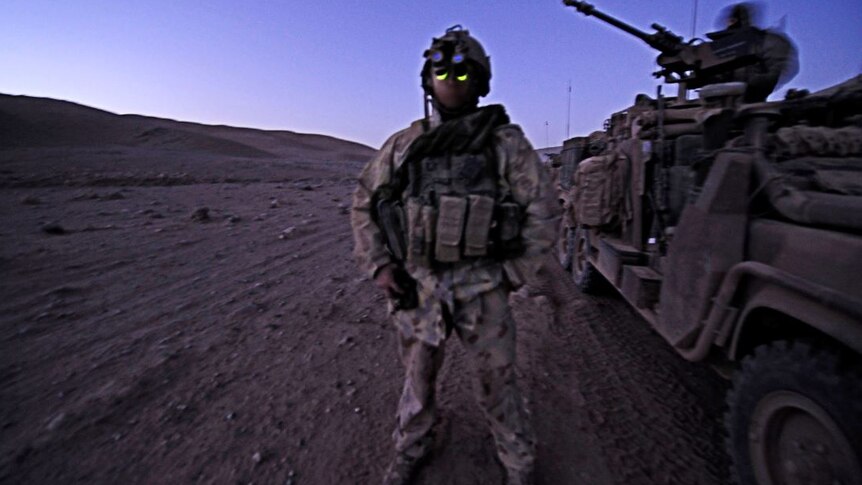 A soldier from 2nd Commando Regiment in the early morning light in Afghanistan.