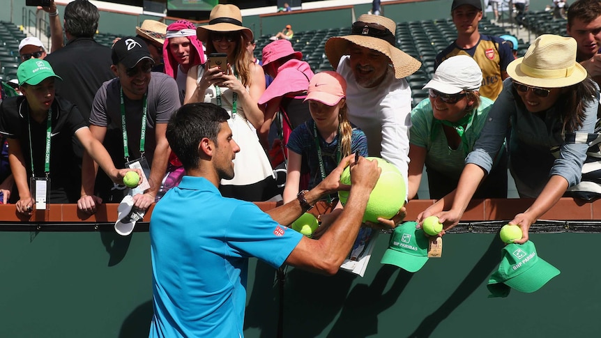 Novak Djokovic signs autographs at Indian Wells