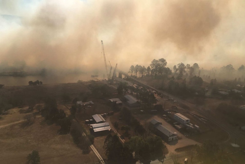 A grassfire at Tabulam which jumped the Clarence River and may be creating spot fires.